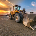 excavator at the end of a working day in a construction site